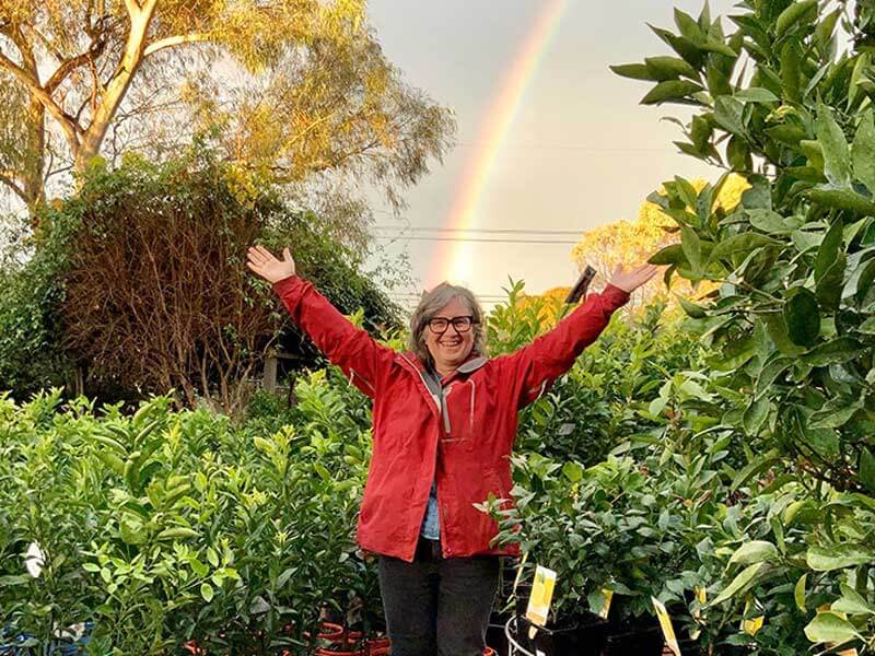 Woman, smiling, rainbow, garden